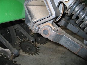 Up close look at parts on a John Deere drill.