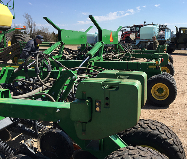 Farmer-build weight bracket on JD 1890 drill.